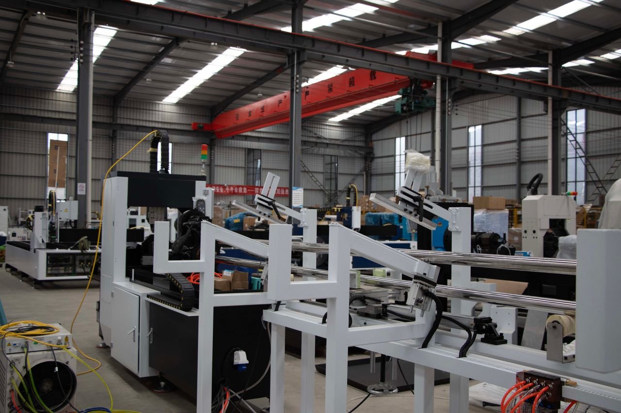 Interior view of a modern industrial manufacturing facility with machinery and equipment.