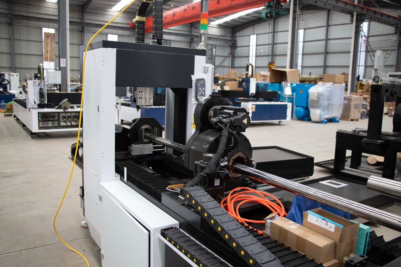 services-02 Advanced CNC machine and equipment in a spacious factory environment, showcasing industrial manufacturing.